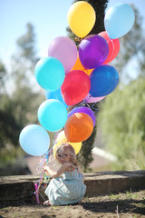 Small Child Enjoying a Fashionable Outdoor Birthday Party