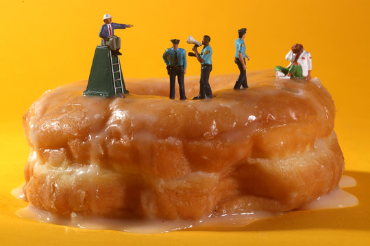 Police Officers in Conceptual Food Imagery With Donuts