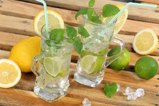 Drink with lime, lemon and ice
