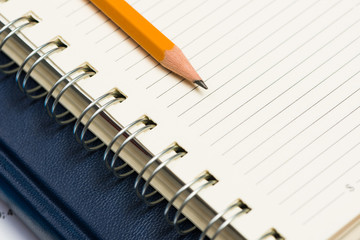 notebooks and pencil on the desk