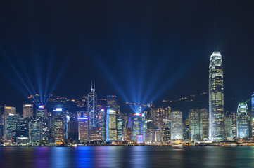 Fototapeta na wymiar Laser show in Victoria Harbor of Hong Kong