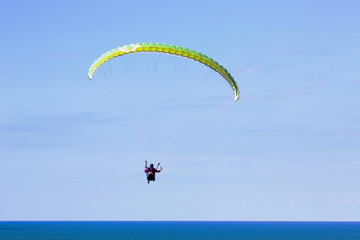 Paraglider flying above Mediterranean near Arsuf coast