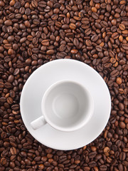 A white cup on beans background
