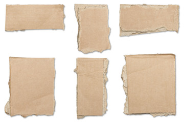 collection of ripped  brown pieces of cardboard, shadows, isolat