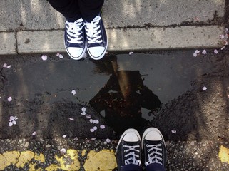 double sneakers street puddle