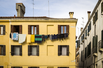 Fototapeta na wymiar Washings Drying outside of a Traditional House in Venice