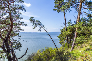 romantic steep cliff with lake
