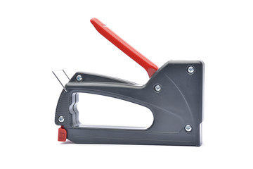 Construction stapler on white