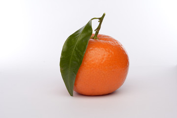 Ripe sweet tangerine, isolated on white