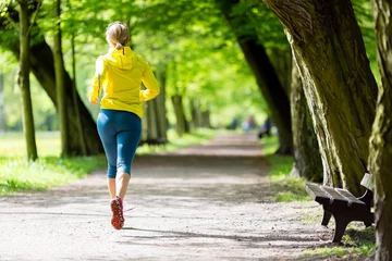 Wall murals Jogging Woman runner running jogging in summer park