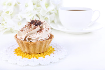 Tasty cake on table on light background