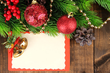 Christmas card on wooden background