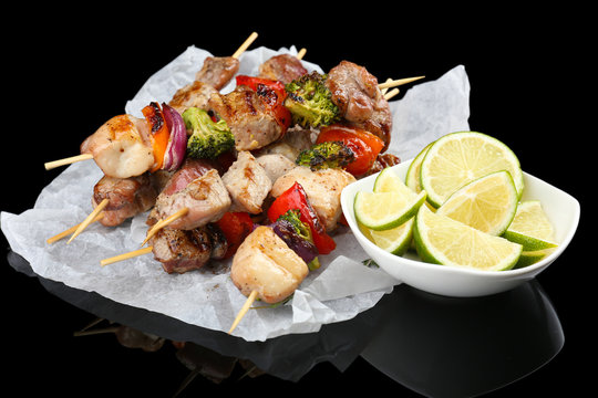 Pork kebab on black background