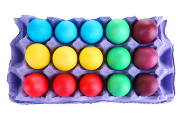 Colorful Easter eggs in tray isolated on white