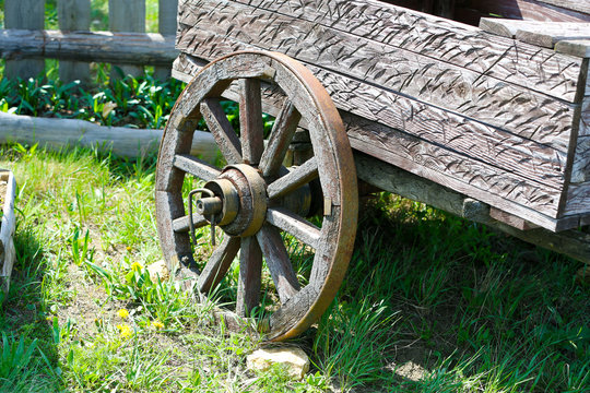 Wooden cart on nature background