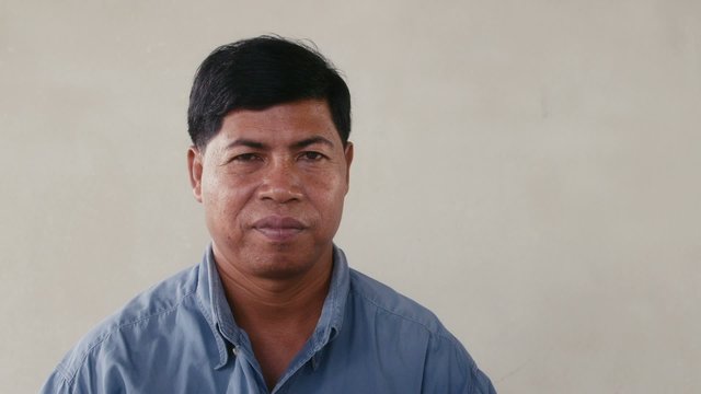 50of56 Portrait of Asian man looking at camera, people emotions