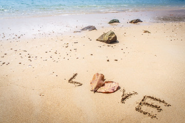 Isolated white sand beach on tropical island