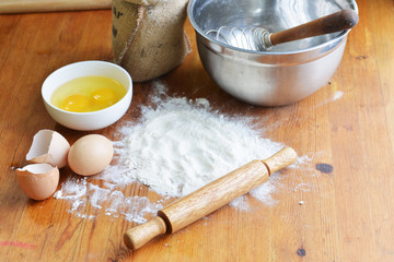 flour on wooden background