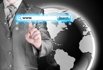 Businessman pushing virtual search bar
