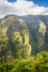 Fototapeta na wymiar Madeira inside - amazing view on mountains, houses and sunrise