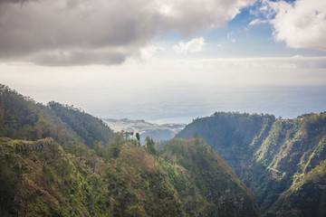 Naklejka premium Madeira inside - amazing view on mountains, houses and sunrise