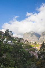 Fototapeta na wymiar Madeira inside - amazing view on mountains, houses and sunrise