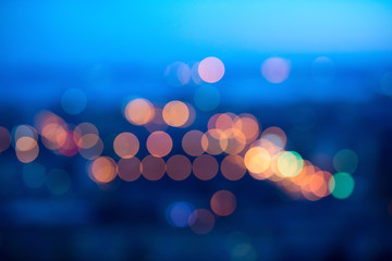 blurring big abstract circular lights bokeh on blue background