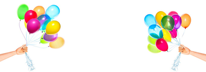 wooden hand gives flying balloons