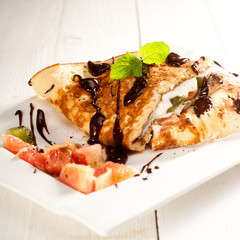 Sponge Pancakes with cheese, fruit, chocolate and mint