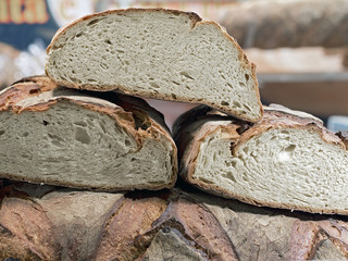 forms of homemade bread on one another