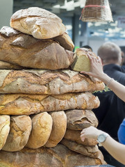 forms of homemade bread on one another