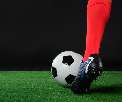 Bal&oacute;n y pie de jugador