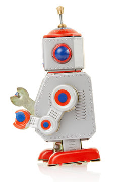 Robot vintage toy side on white, clipping path