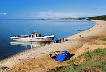 Ship at the shore of Olkhon island on Baikal lake