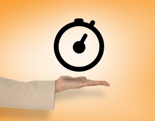 Composite image of female hand presenting clock