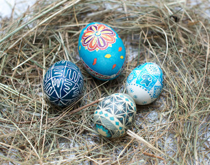Colorful Easter eggs in a little basket.