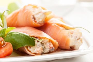 Smoked salmon roll with vegetable salad