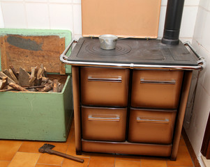 wood burning stove in a kitchen of a mountain home and the axe 2