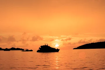 Fotobehang Yacht at Sunset © Richard Carey