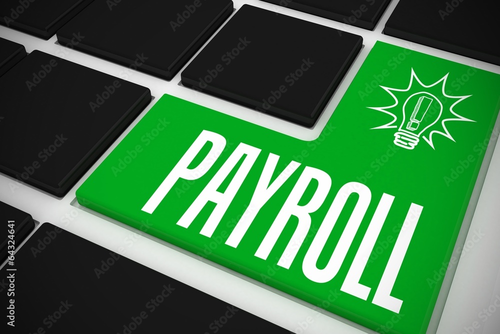 Poster payroll on black keyboard with green key