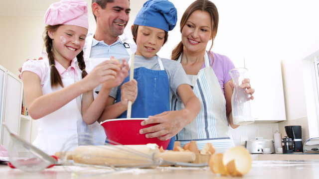 Happy family baking together