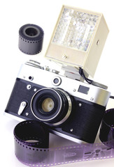 Retro camera with flash and tape isolated on white
