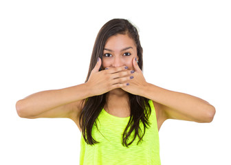 Fototapeta premium speak no evil concept. Young woman covering mouth with hands 
