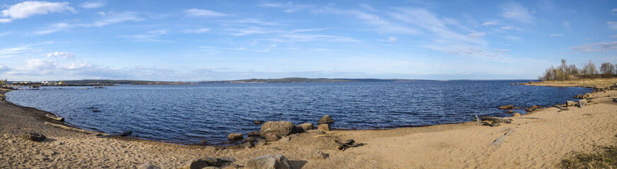 Fototapeta na wymiar Panorama of lake with sandy beach