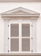 White window with shutters