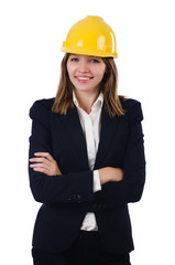 Young businesswoman with hard hat isolated on white