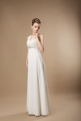 Gorgeous Shapely Woman in Long Smooth White Dress