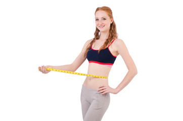 Fototapeta na wymiar Young girl with centimeter in dieting concept