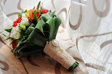 Bridal bouquet with roses and lace