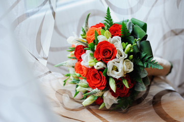 Bridal bouquet with roses and lace